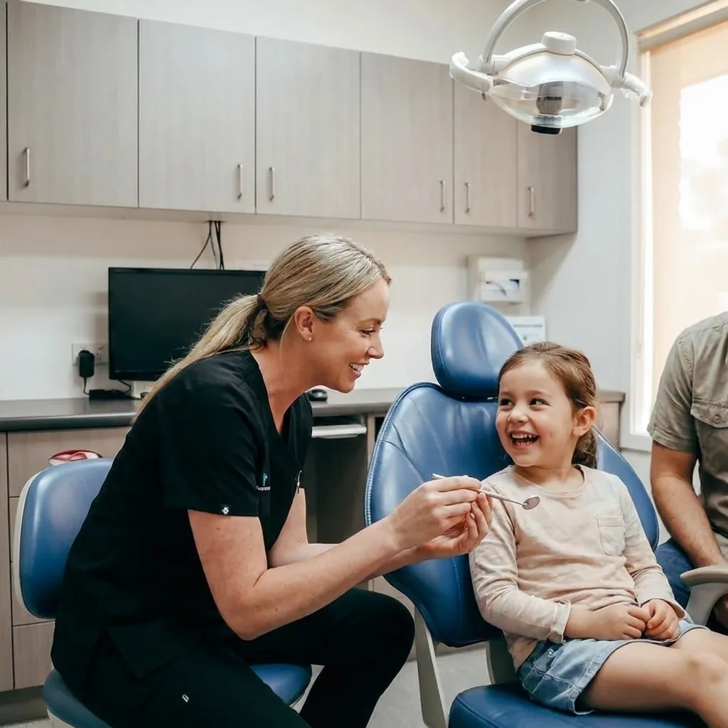A child's first visit at Enhanced Dental Studios, gentle and unhurried.
