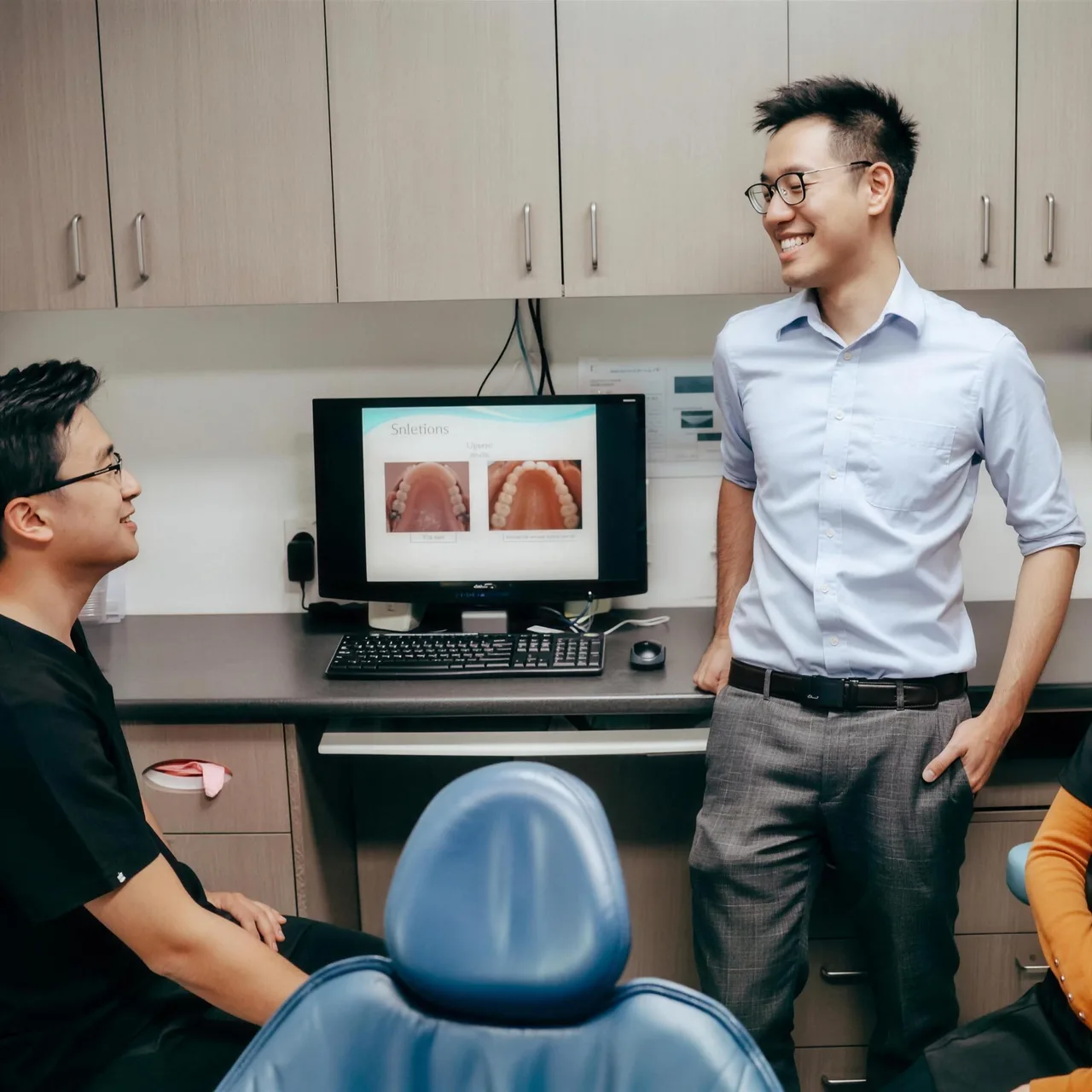 Enhanced Dental Studios clinicians working together in the treatment room.