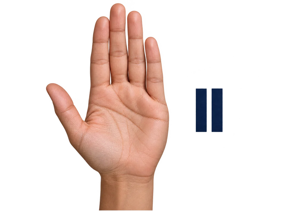 An adult hand and pause marks representing permission to stop.