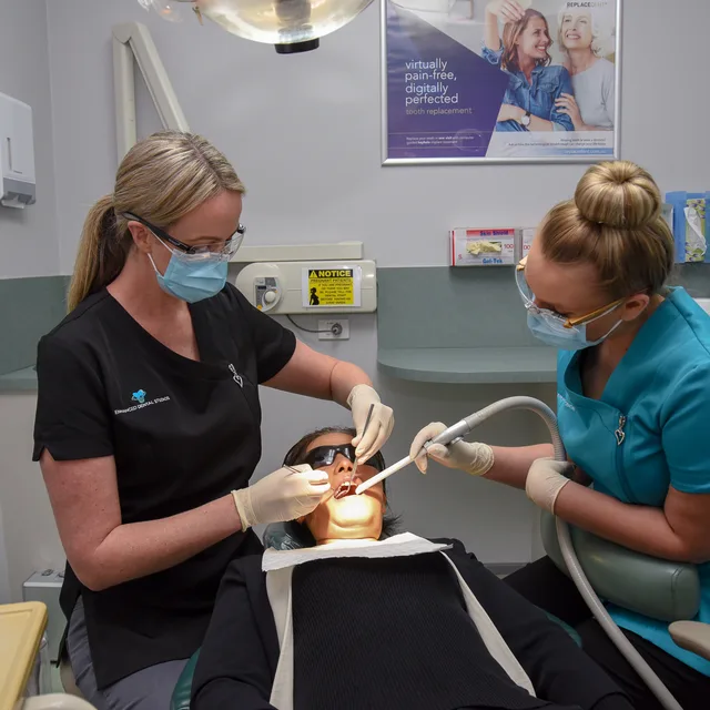 A finished result being checked and cared for at Enhanced Dental Studios.
