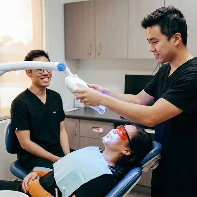 An in-chair whitening session under way at Enhanced Dental Studios.