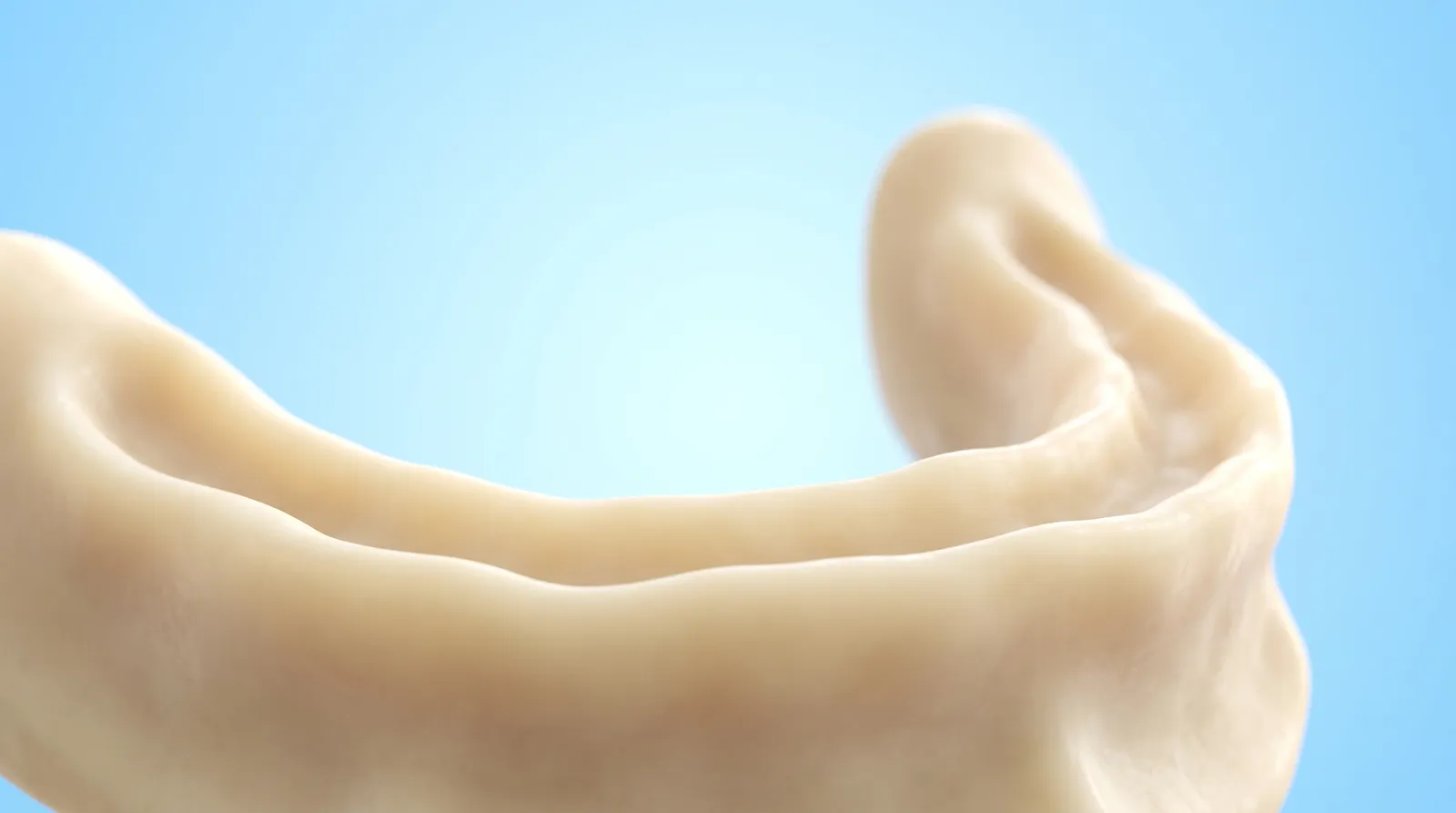 A low flat empty gum ridge alone in the frame, seen from a low angle