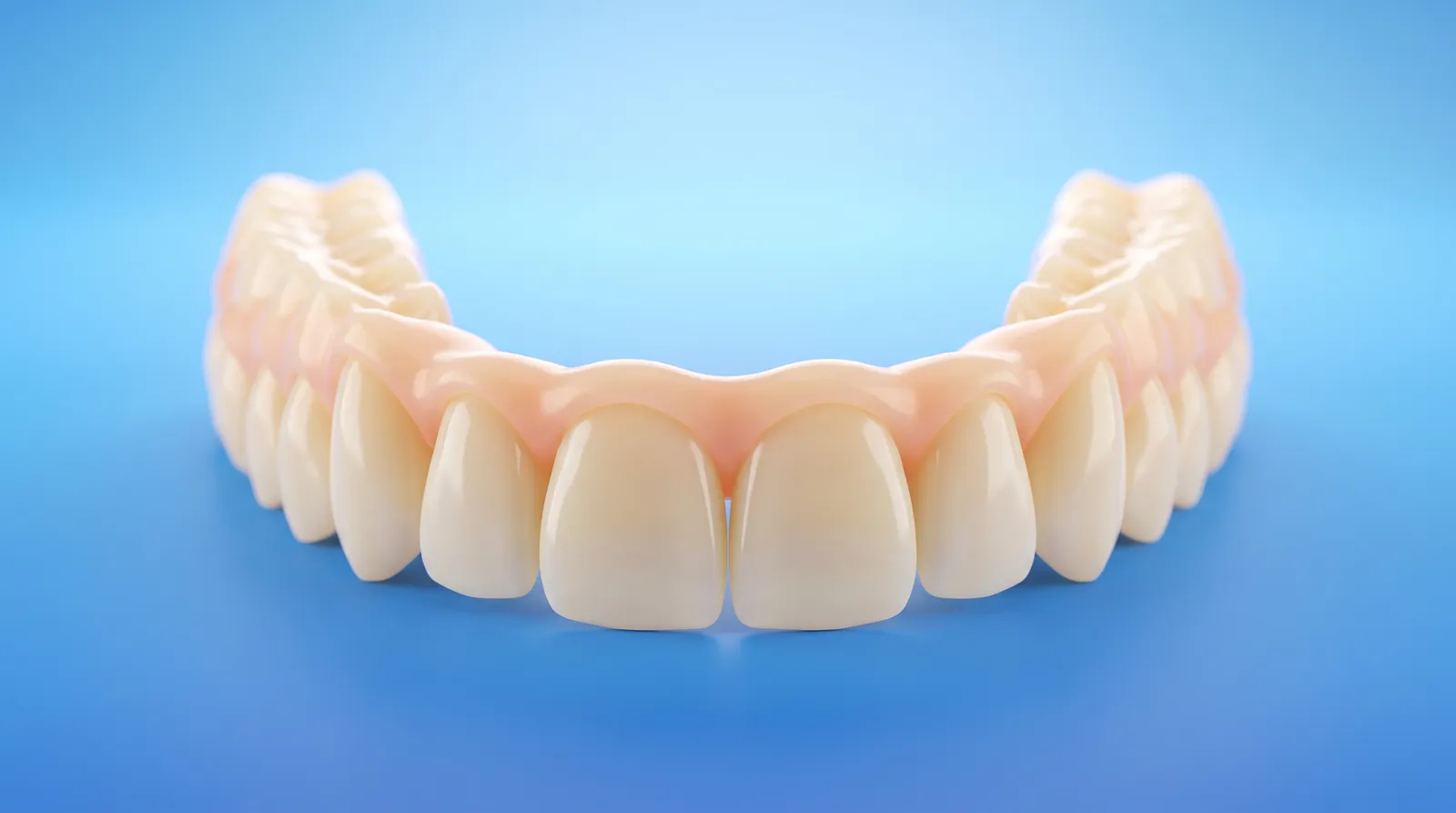 A bright clean dental arch model with smooth polished tooth surfaces